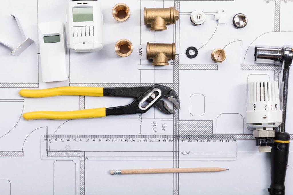 75542782-thermostat-with-work-tools-on-blueprints 75542782-thermostat-with-work-tools-on-blueprints